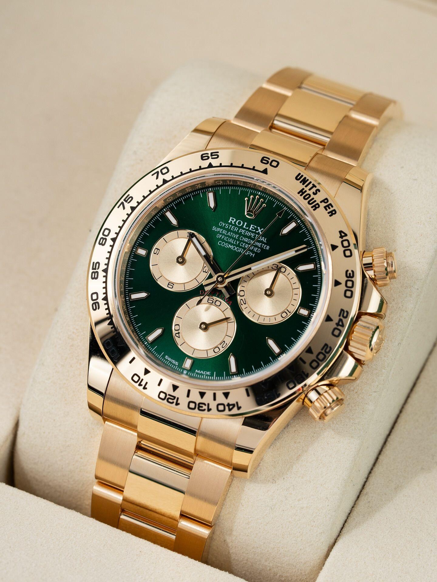Rolex Cosmograph Daytona Green dial with gold strap