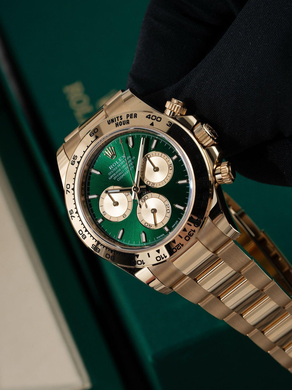 Rolex Cosmograph Daytona Green dial with gold strap