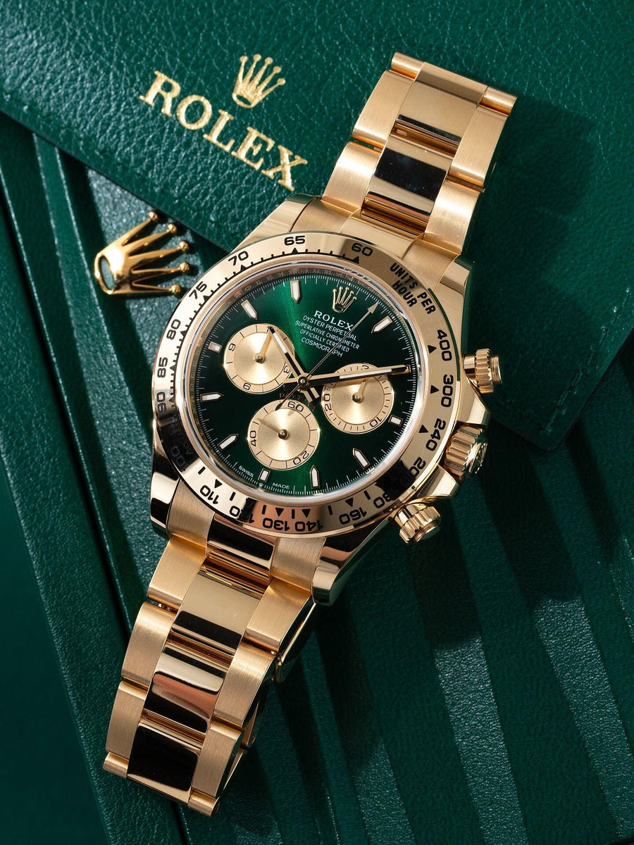 Rolex Cosmograph Daytona Green dial with gold strap
