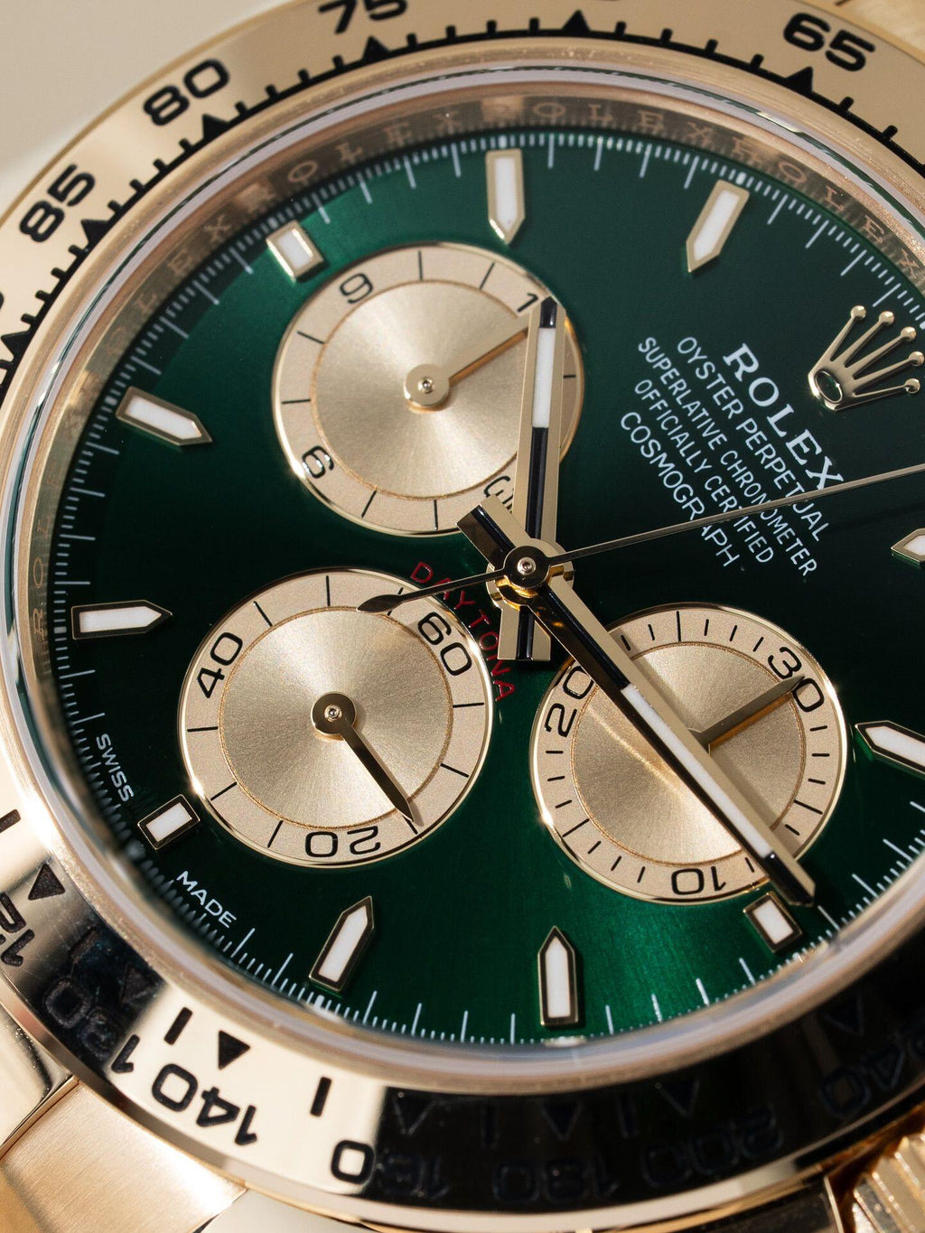 Rolex Cosmograph Daytona Green dial with gold strap