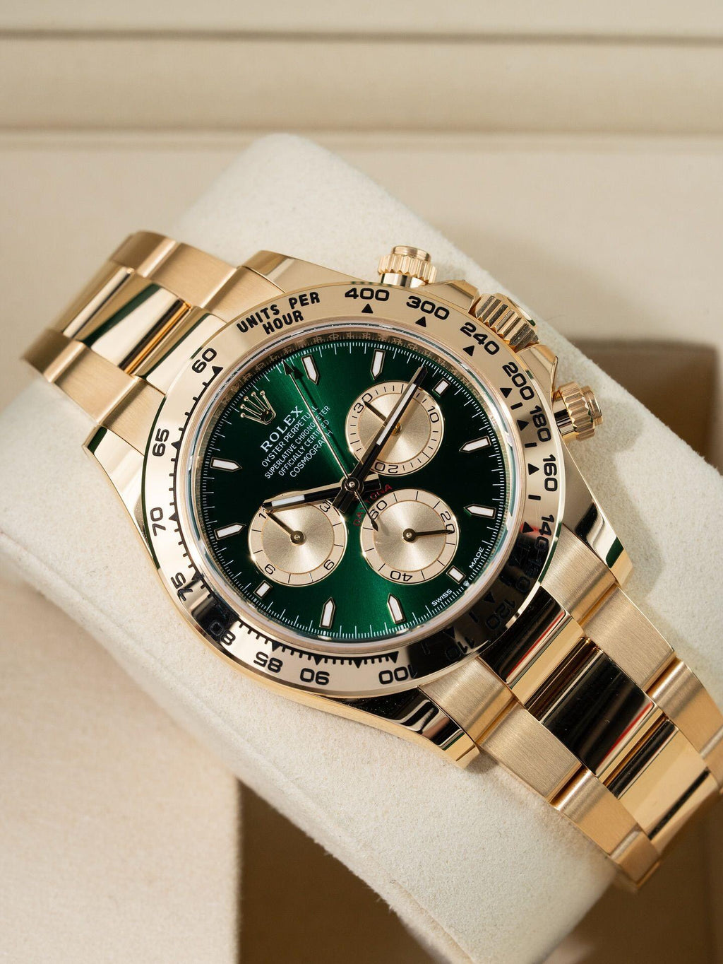 Rolex Cosmograph Daytona Green dial with gold strap