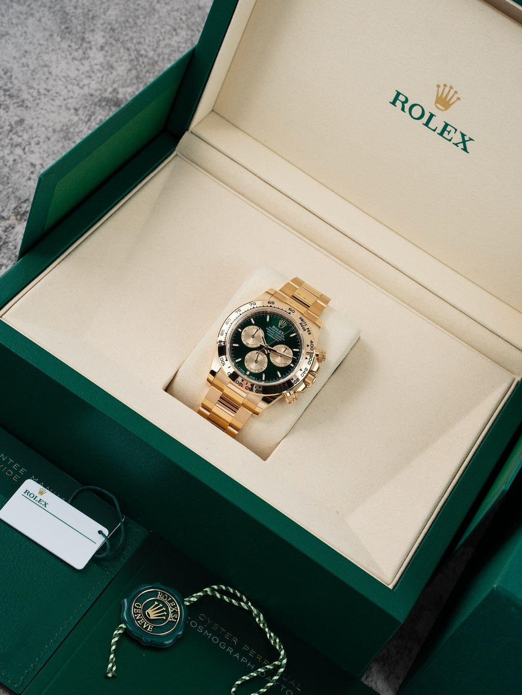 Rolex Cosmograph Daytona Green dial with gold strap